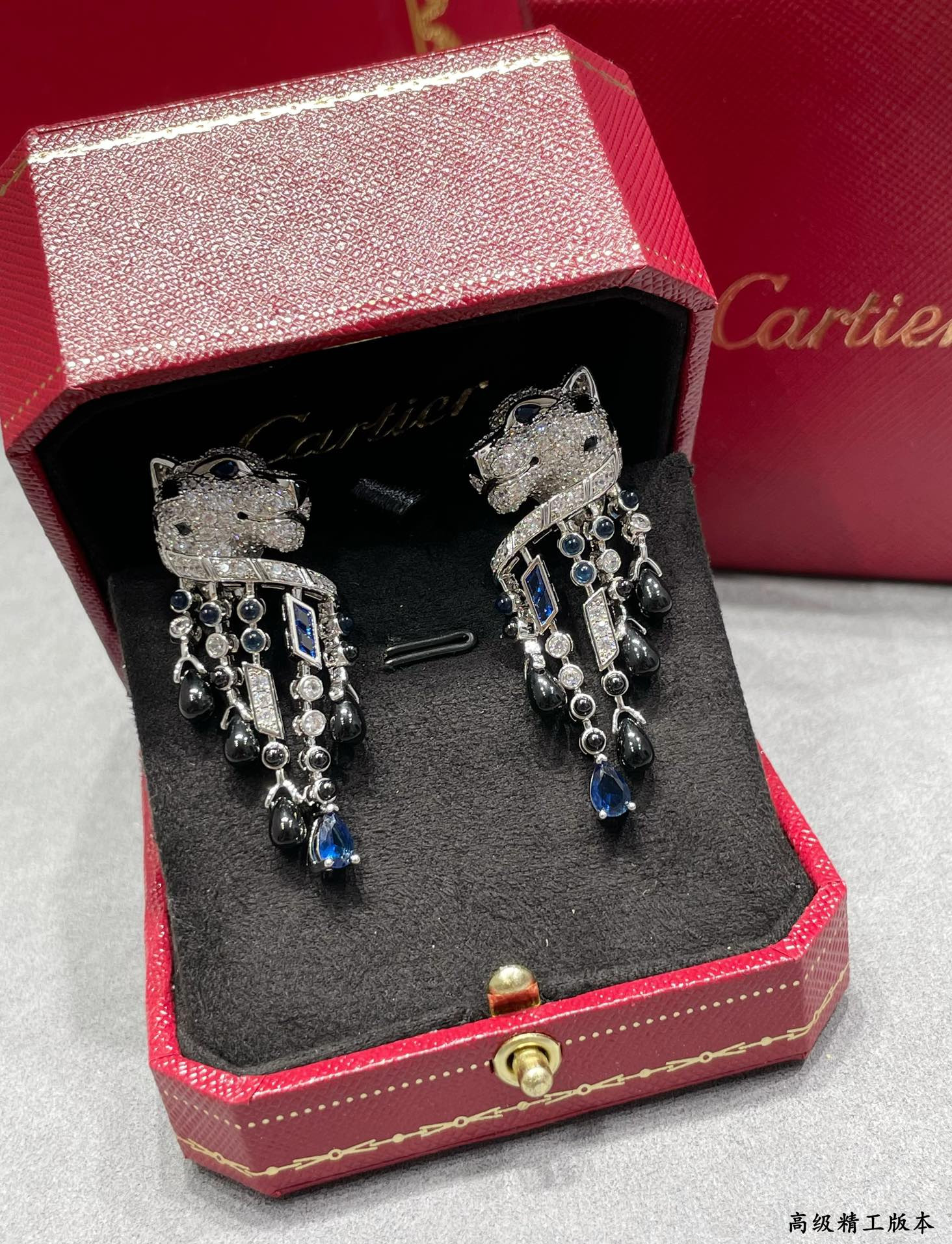 ca*t*er black onyx blue Di*m*nd leopard earrings