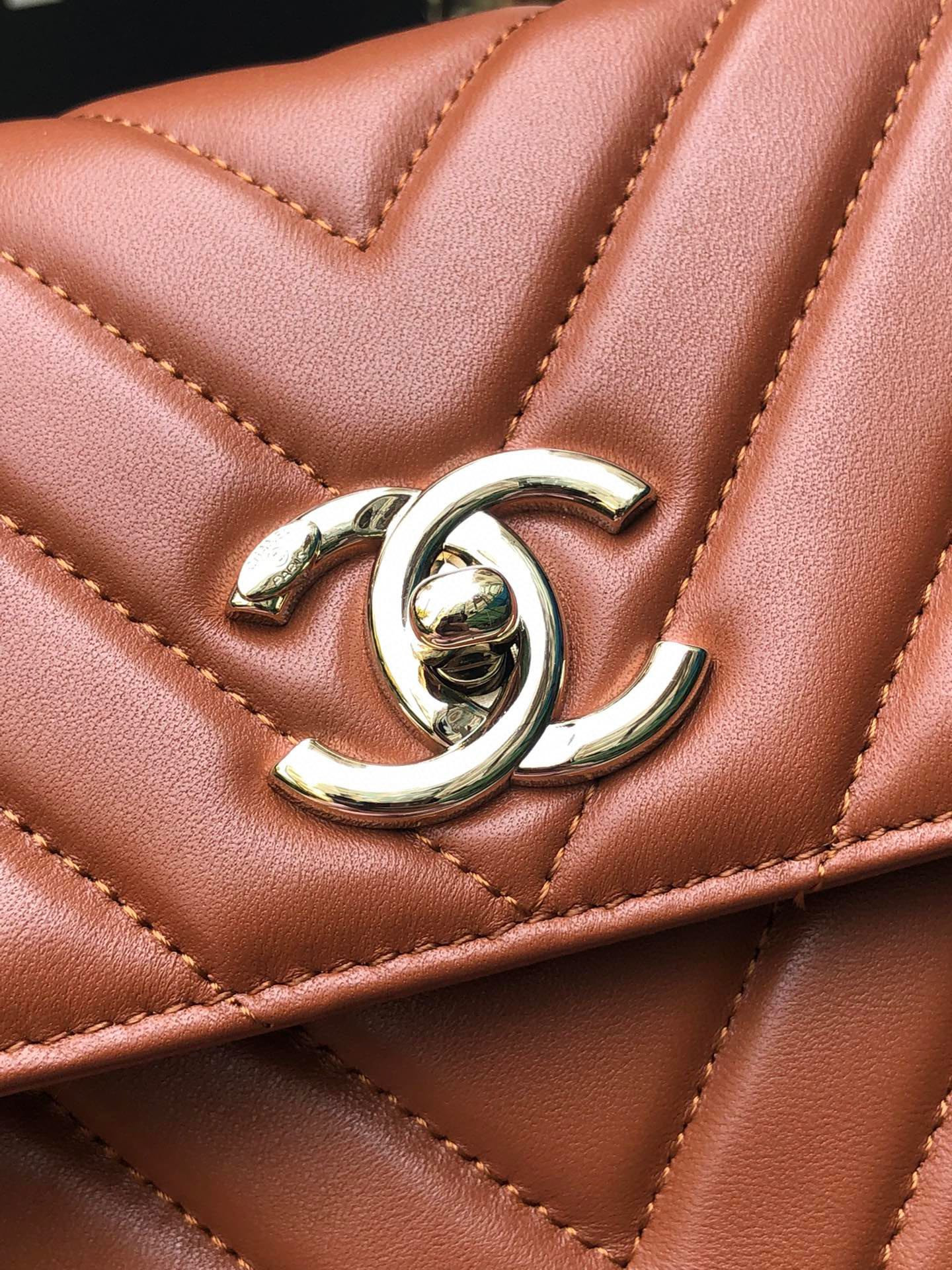 Ch*el flap bag with top handle orange 6.6 × 9.8 × 4.7 in