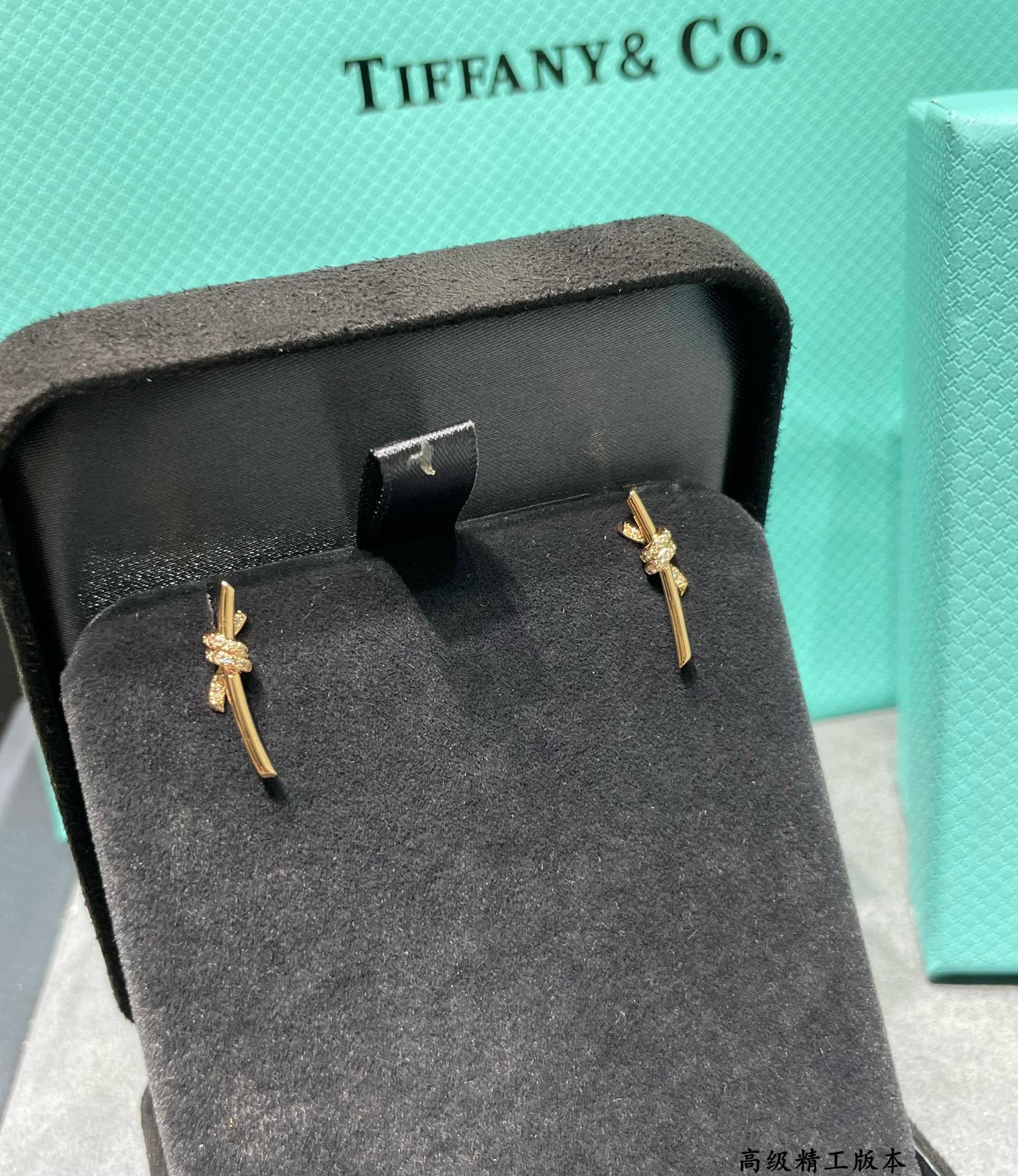 T*f*ny & Co. Half-D1am0nd T Wire Knot Stud Earrings