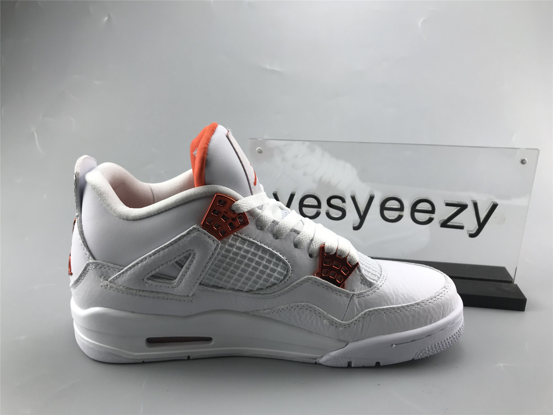 UA AIR JORDAN 4 RETRO METALLIC ORANGE