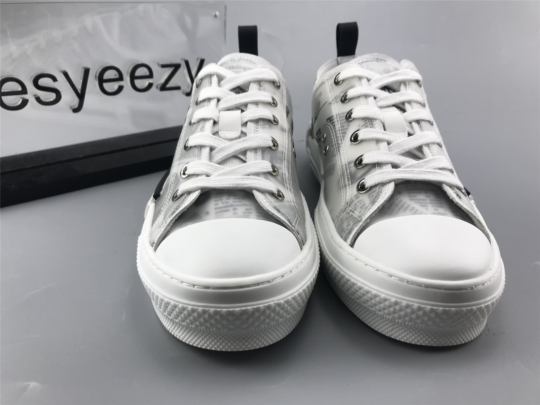 ua D10r b23 low top daniel asham newspaper