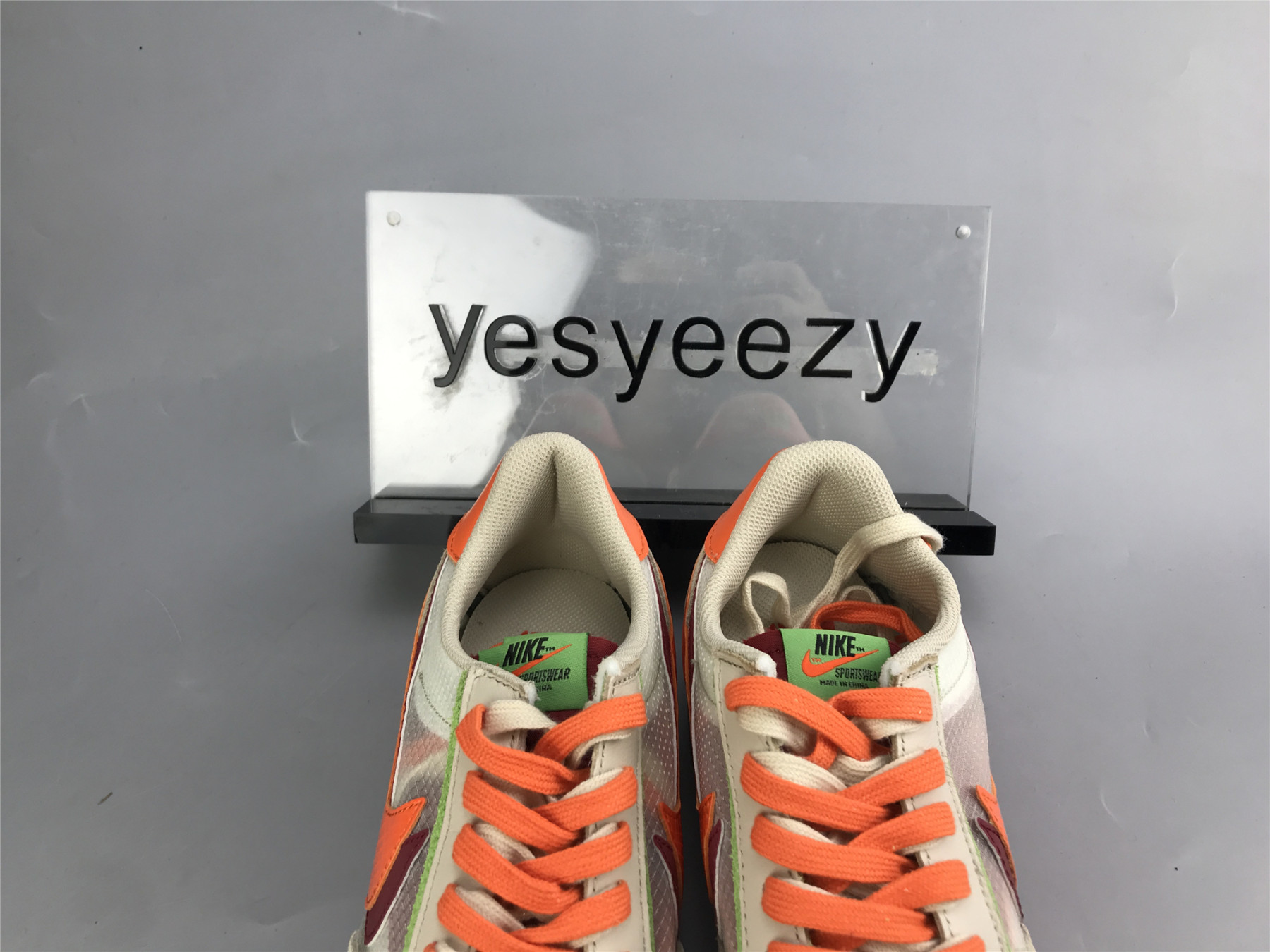 UA NIKE LDWAFFLE CLOT SACAI NET ORANGE BLAZE