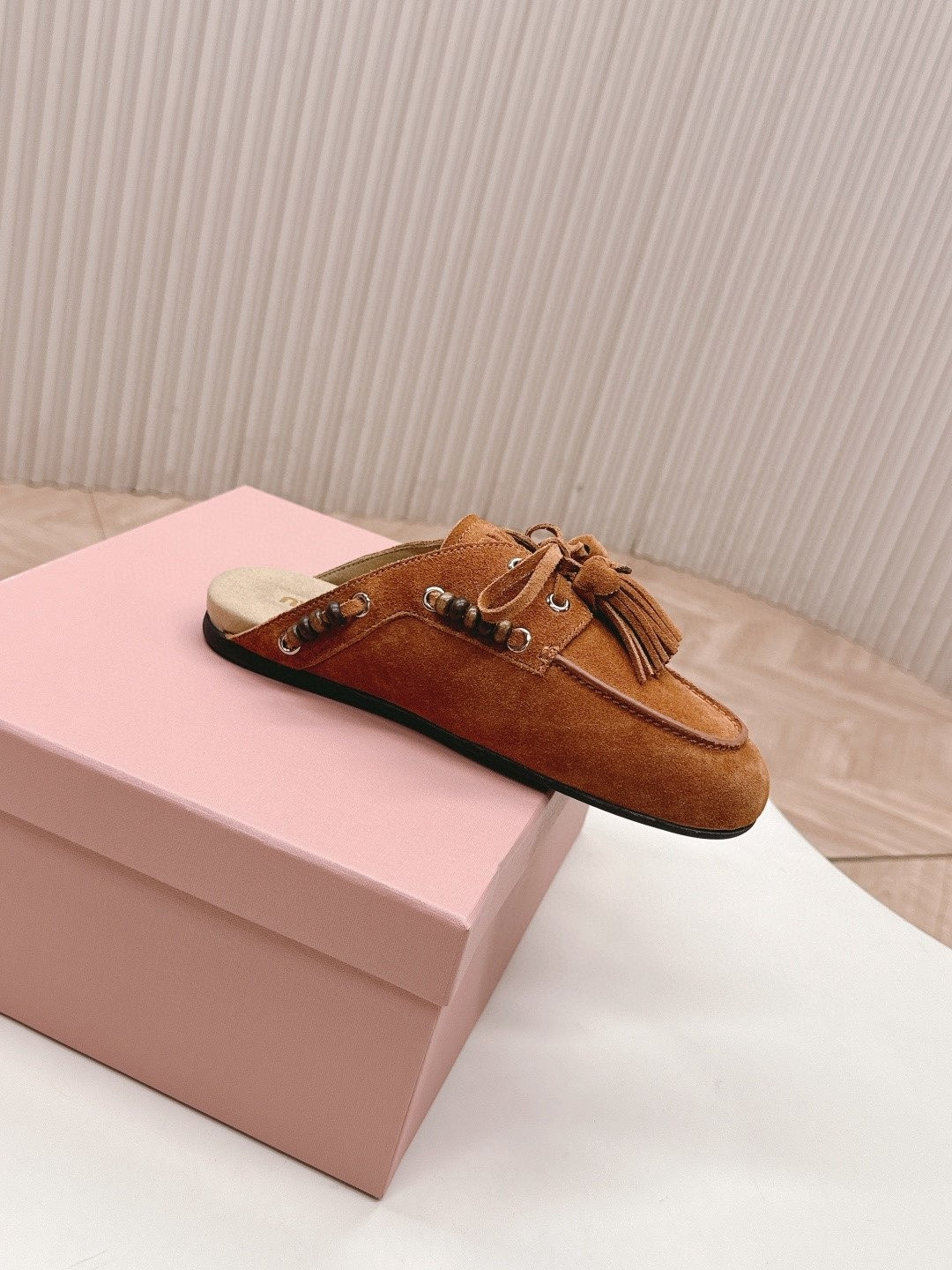 UA Miu Miu Tassel Mules