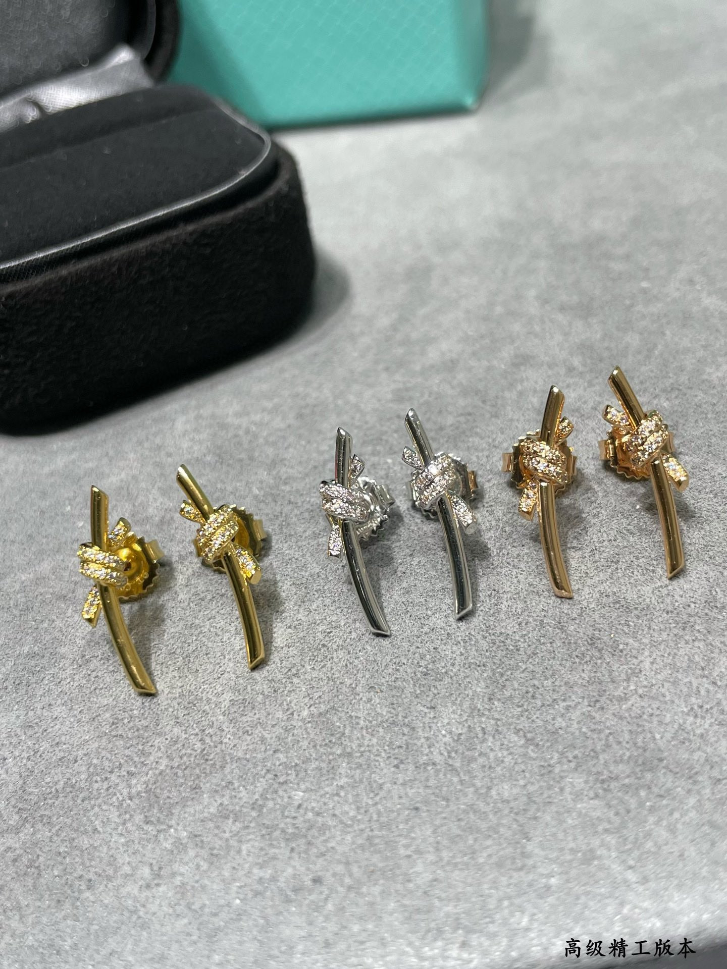 T*f*ny & Co. Half-D1am0nd T Wire Knot Stud Earrings