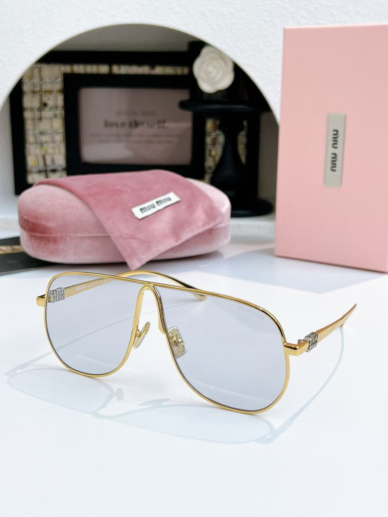 Miu Miu Glasses SMUA56