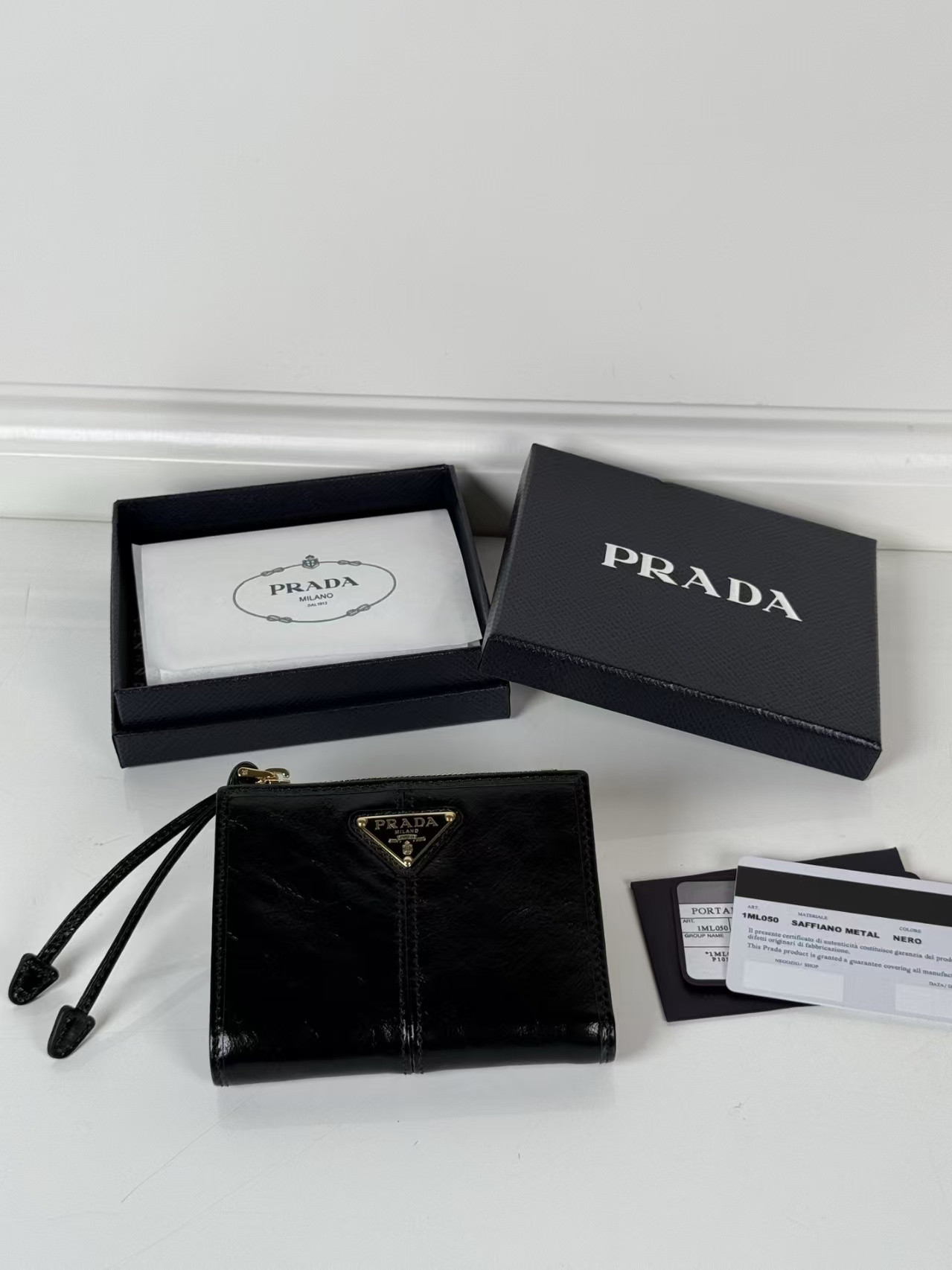 Pra*a Leather Wallet