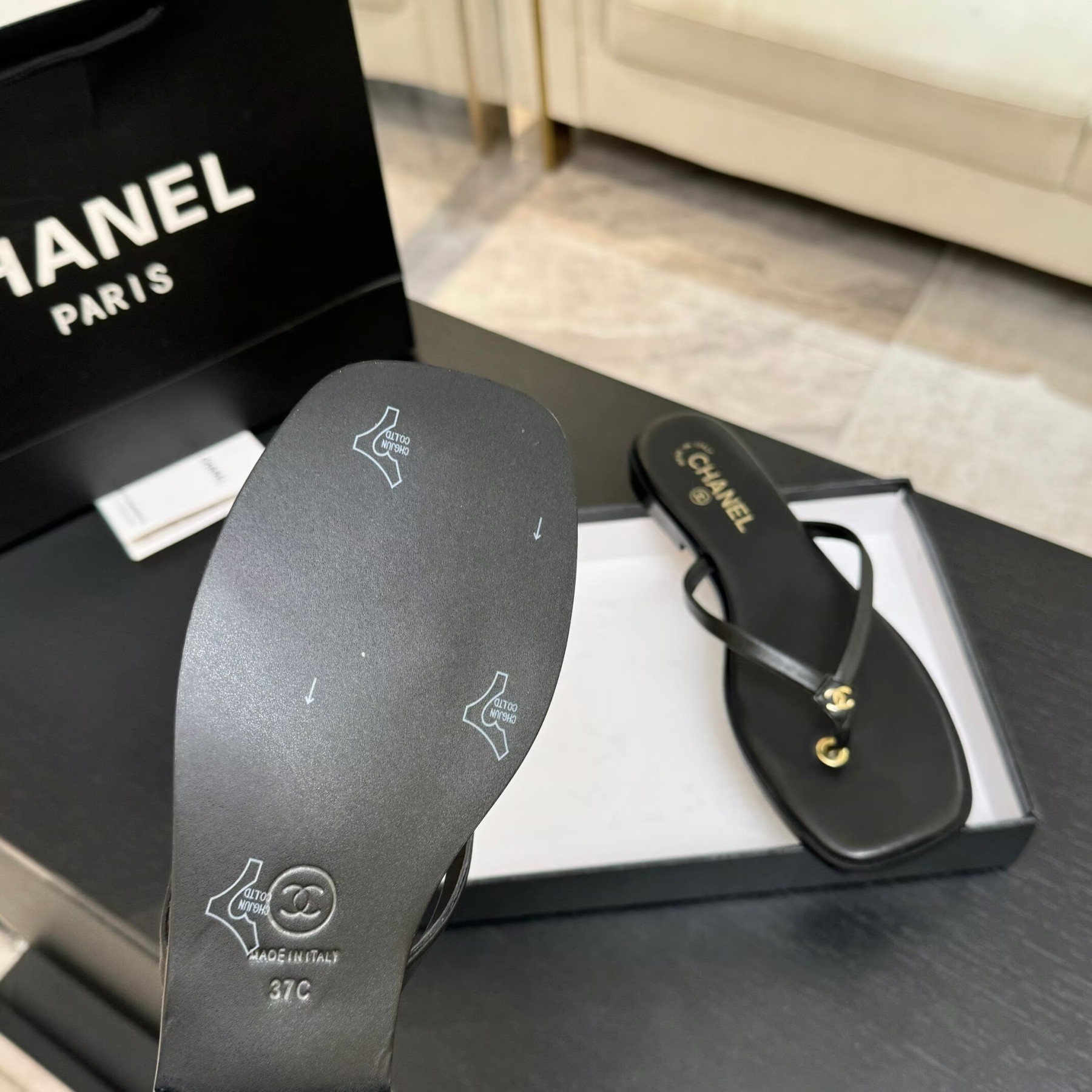 UA Ch**el Times Square Thong Sandals