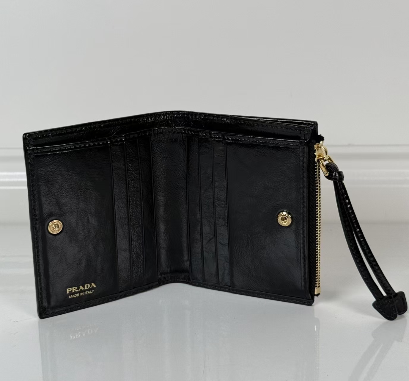 Pra*a Leather Wallet