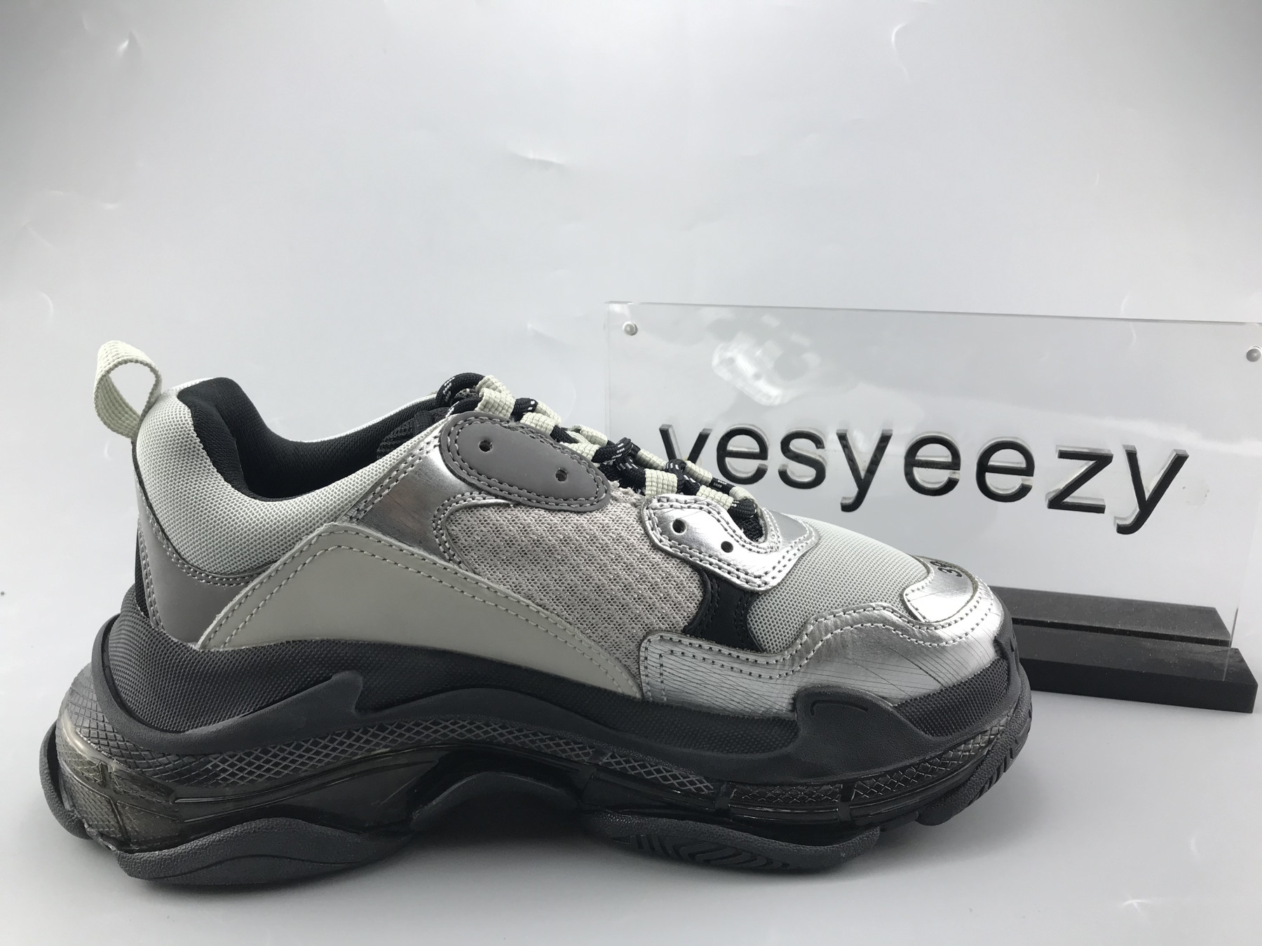 UA TRIPLE S SNEAKER BLACK AND SLIVER