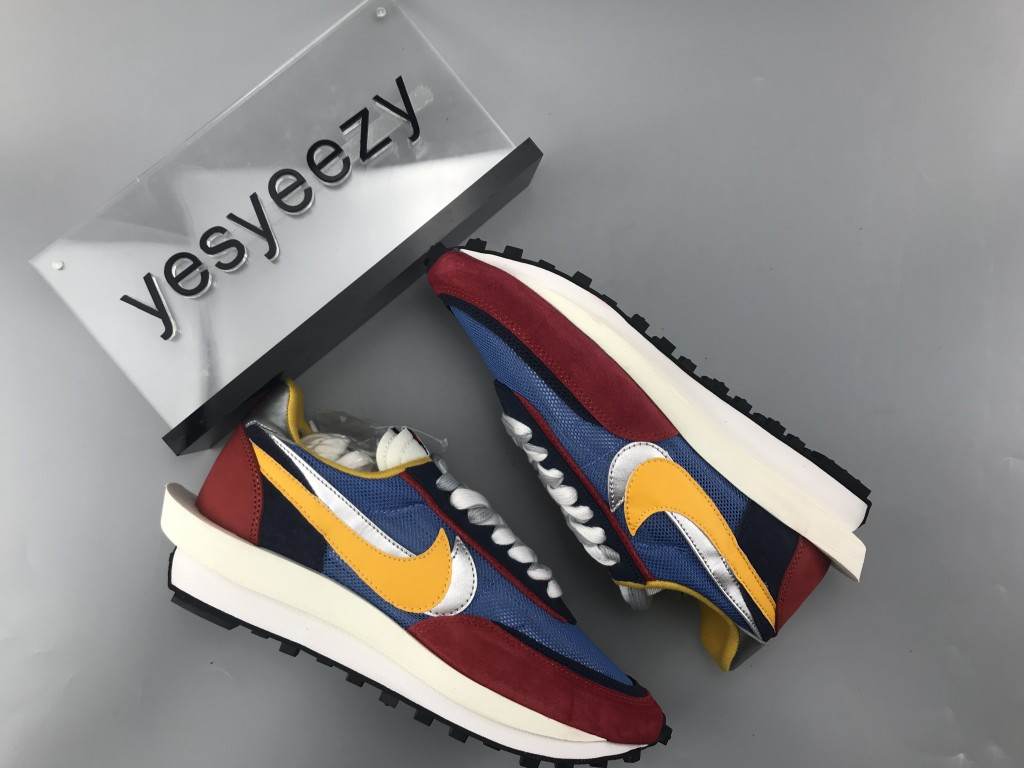 UA NIKE LDWAFFLE/SACAI "VARSITY BLUE"