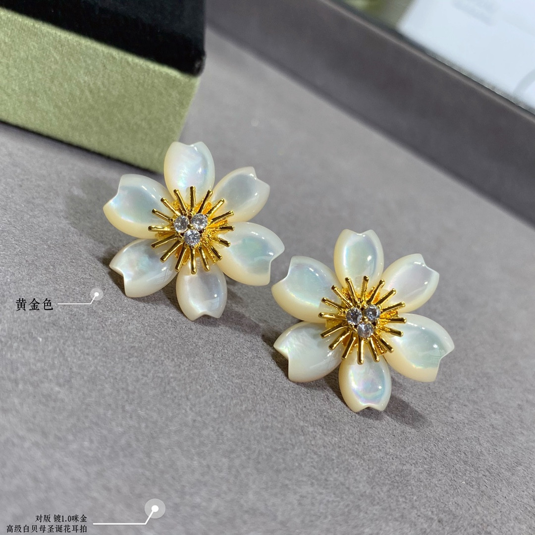 V*n Cl**f & Arpels White Mother-of-Pearl Christmas Flower Earrings