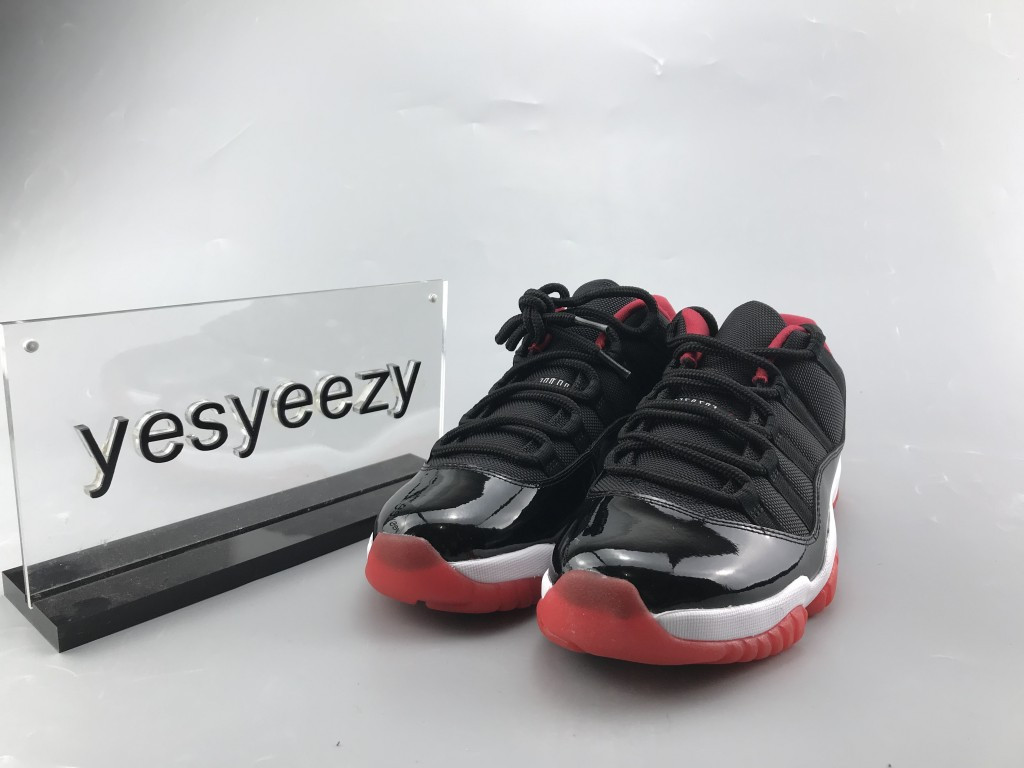 UA AIR JORDAN 11 RETRO LOW BRED