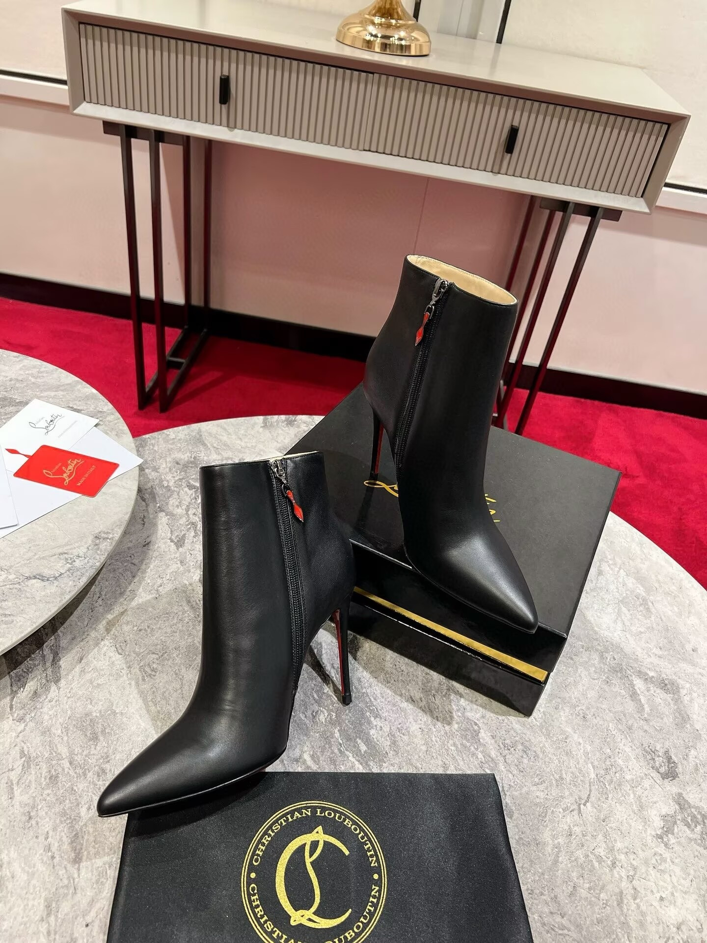 UA Chr1st1an Louboutin Miss Z Booty 100 mm Low Boots Calf leather Black