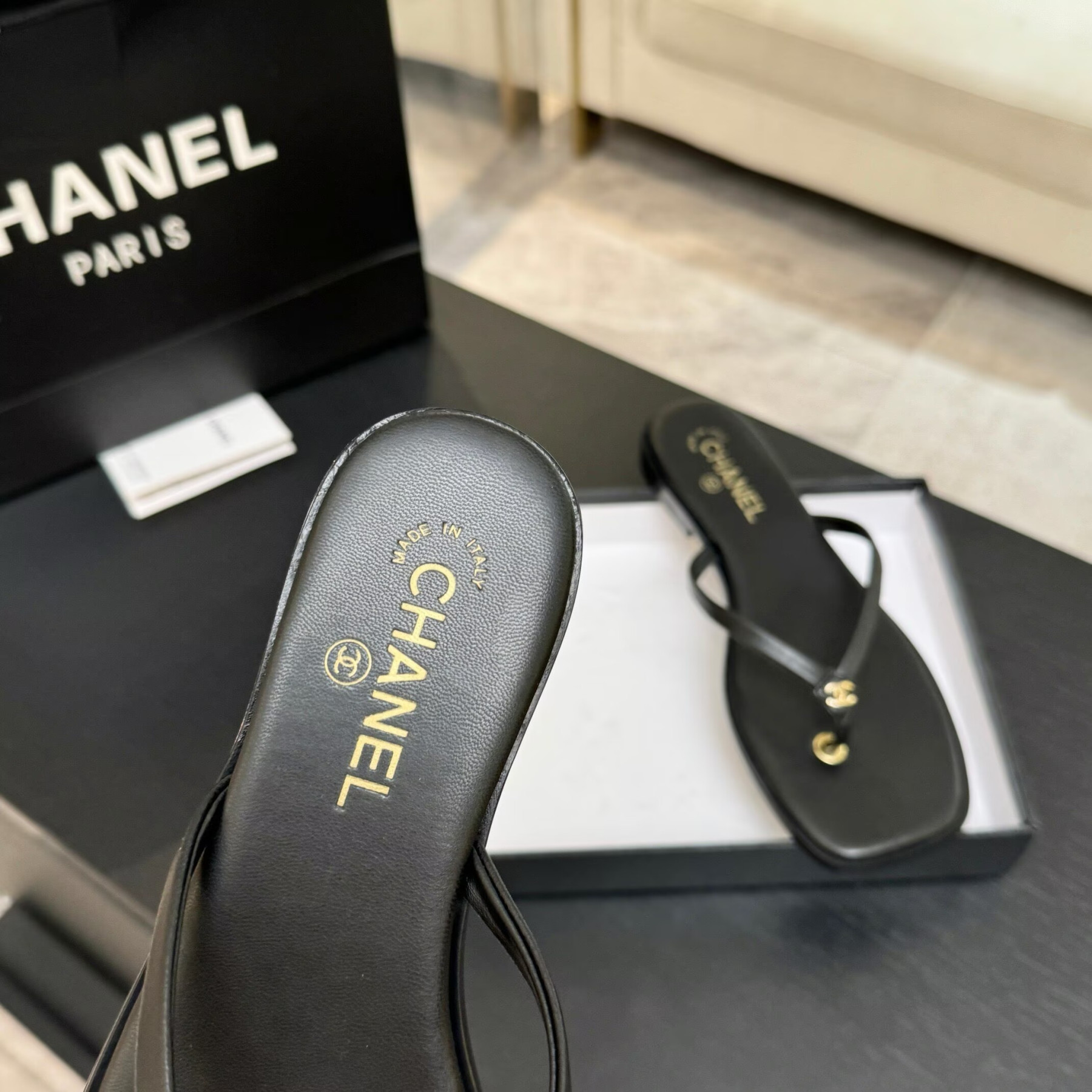 UA Ch**el Times Square Thong Sandals