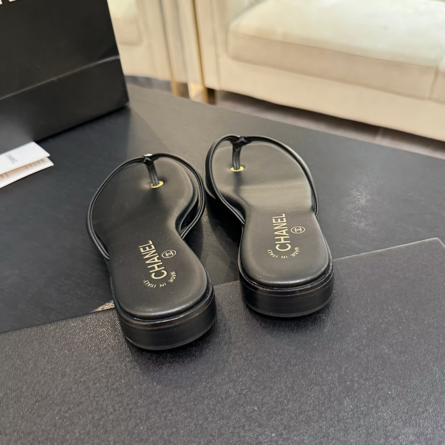 UA Ch**el Times Square Thong Sandals