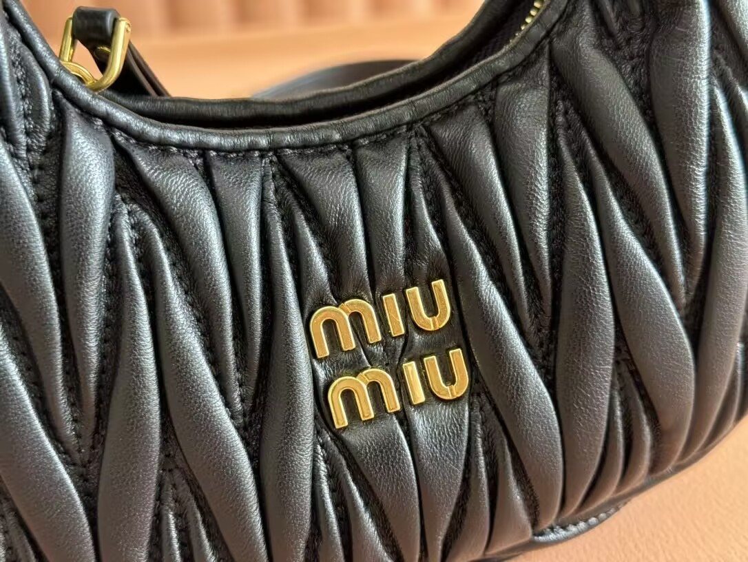 Miu Miu Wander matelassé nappa leather hobo mini-bag 14x17.5x5.5cm