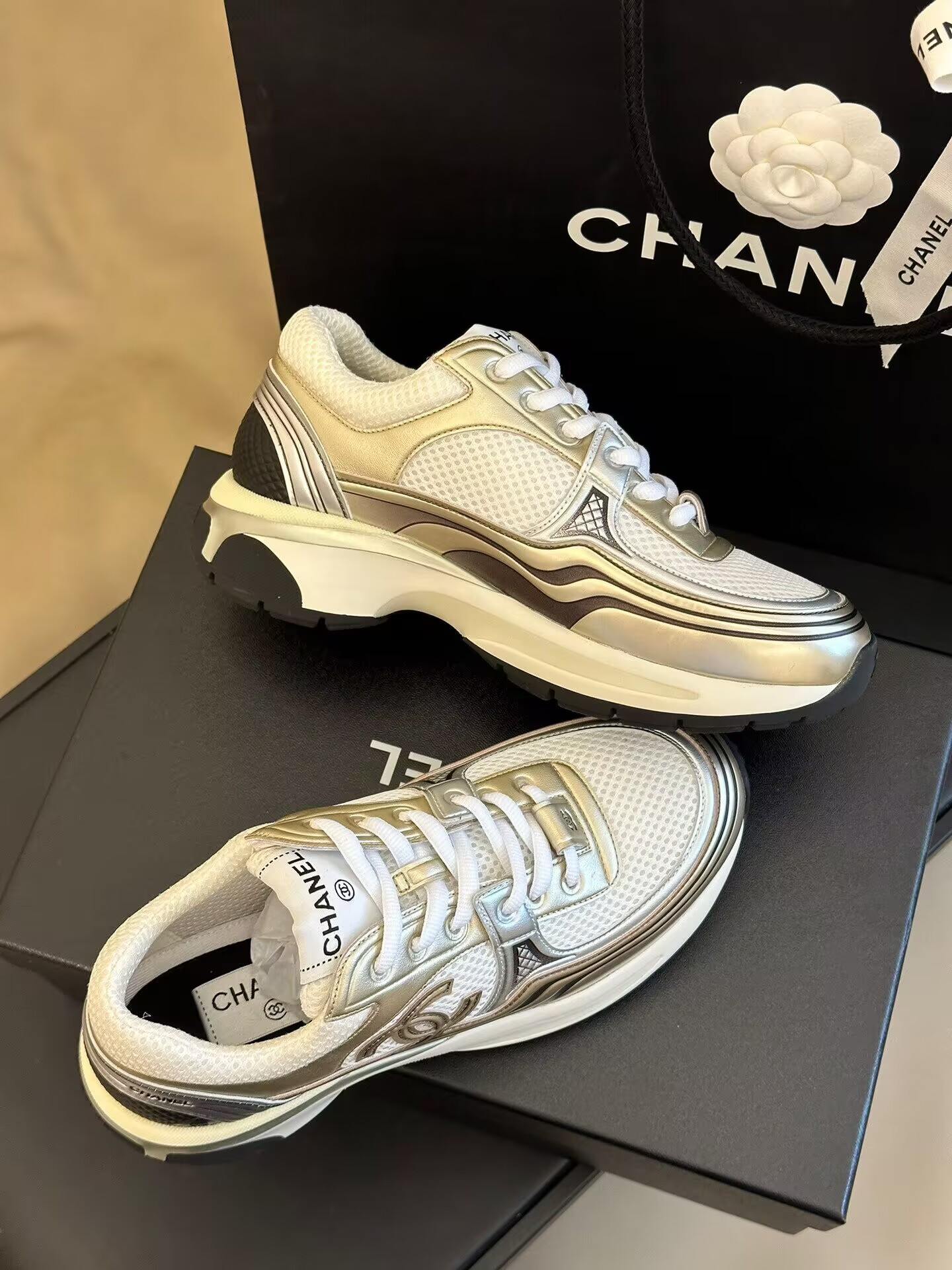 Ch**el CC Runner Gold Laminate