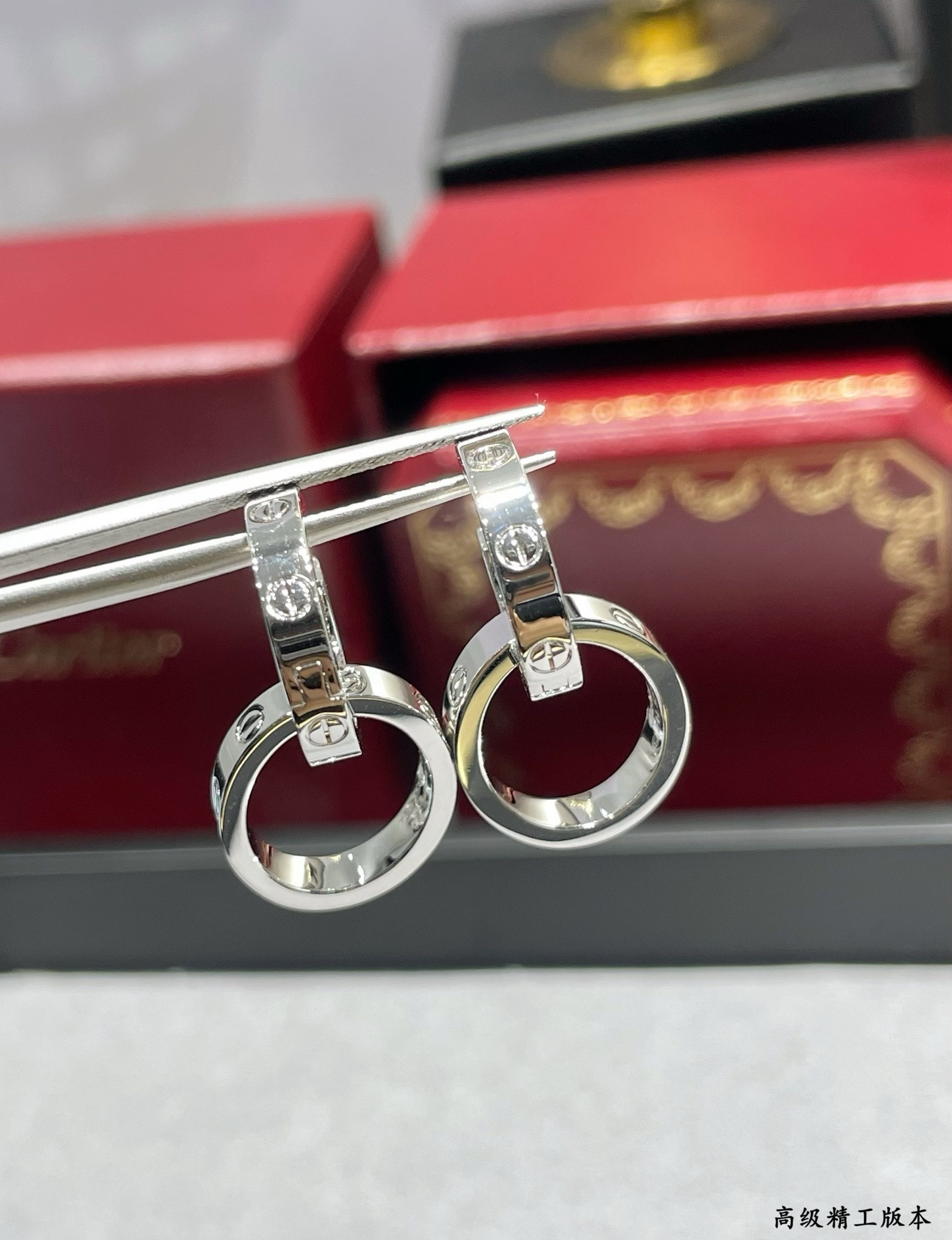 Ca*t1er Double Ring Polished Earrings