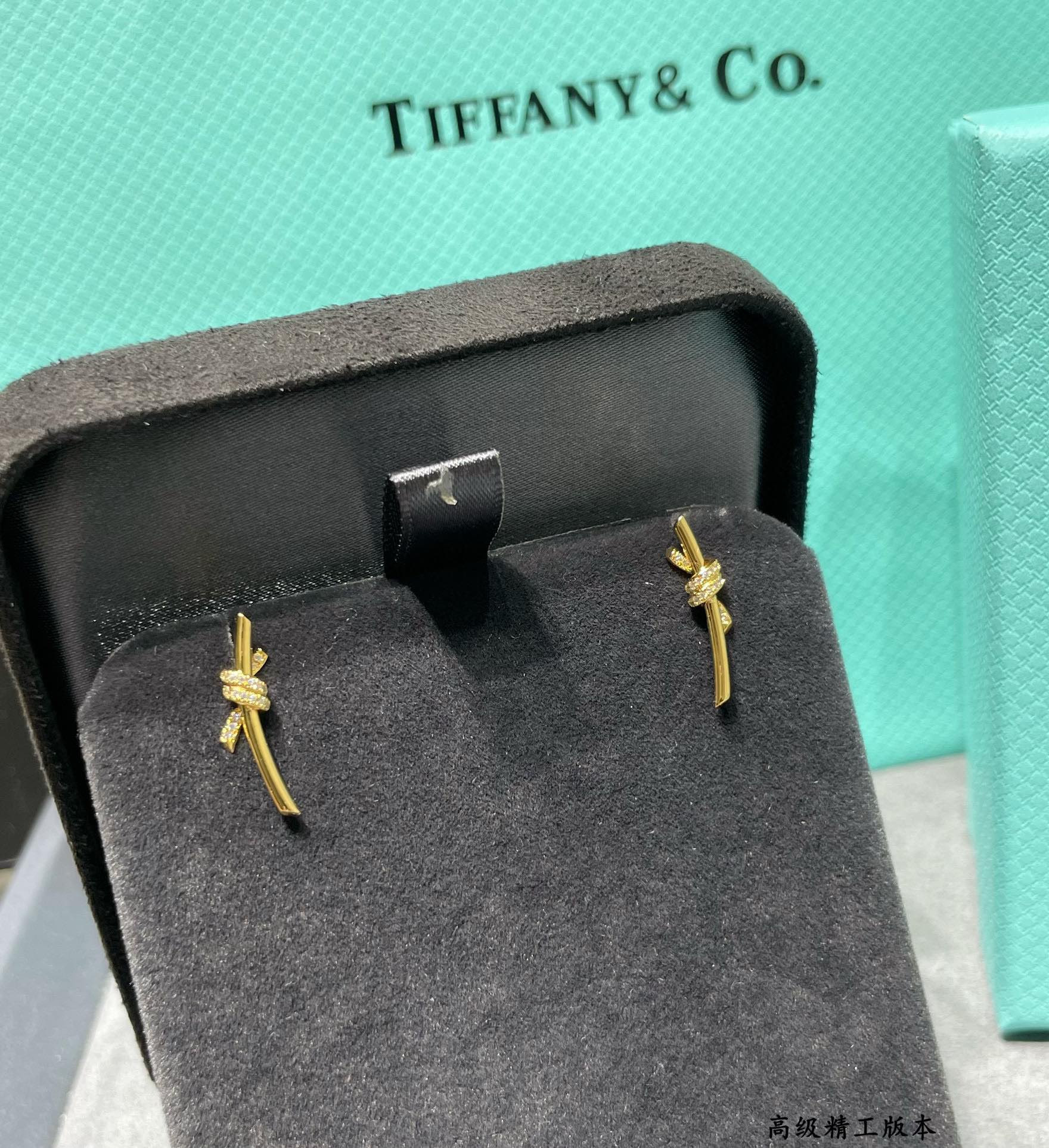 T*f*ny & Co. Half-D1am0nd T Wire Knot Stud Earrings