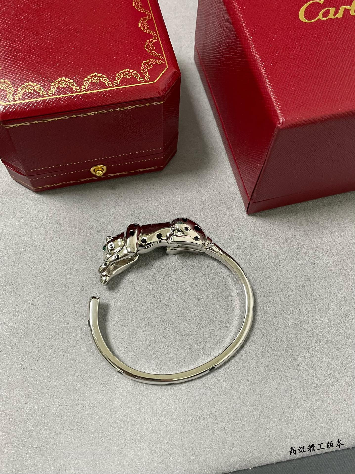 Ca*t1er Light Gold Spotted Leopard Bracelet