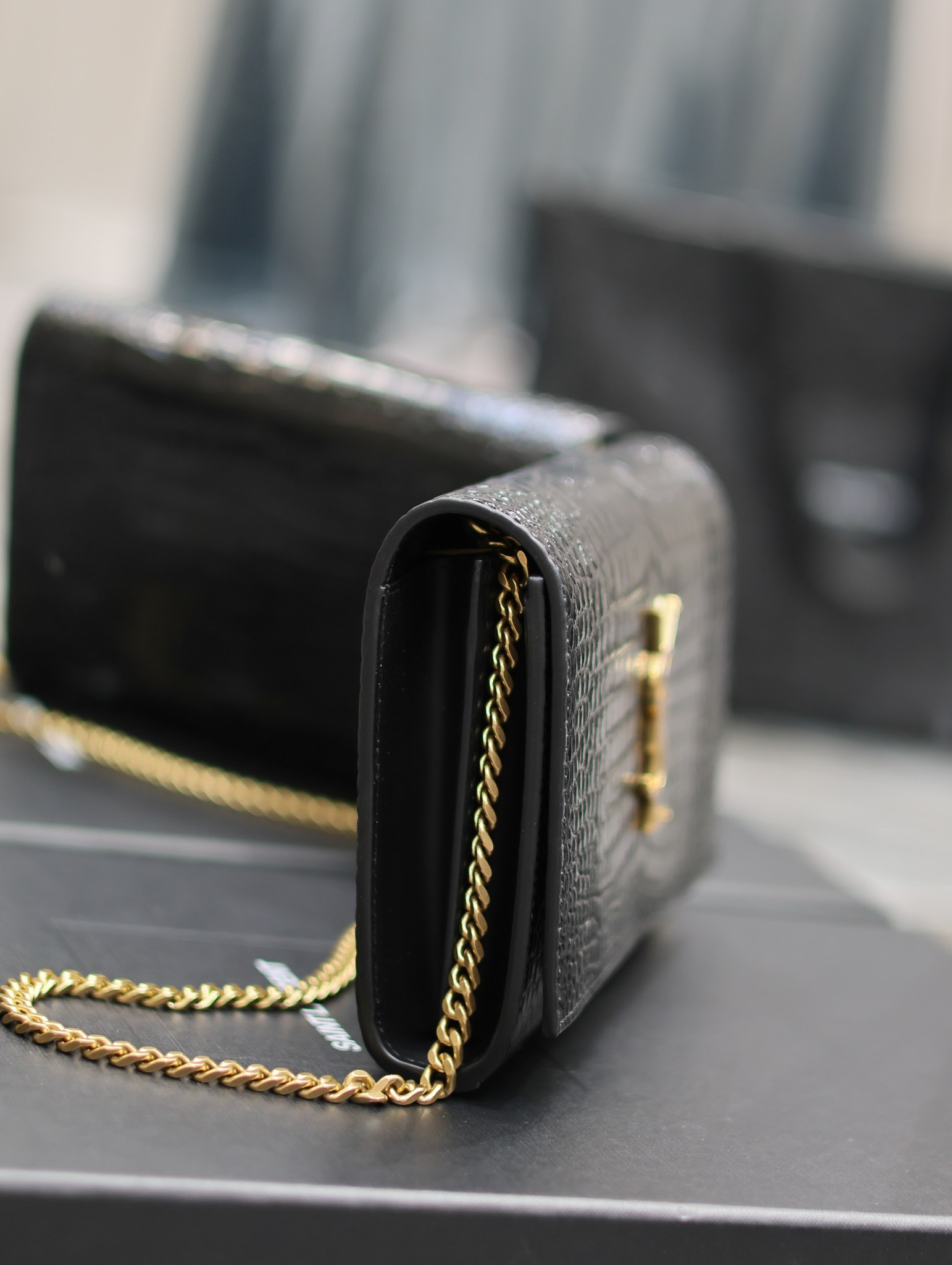 Y51 CASSANDRE CHAIN WALLET IN CROCODILE-EMBOSSED SHINY LEATHER
