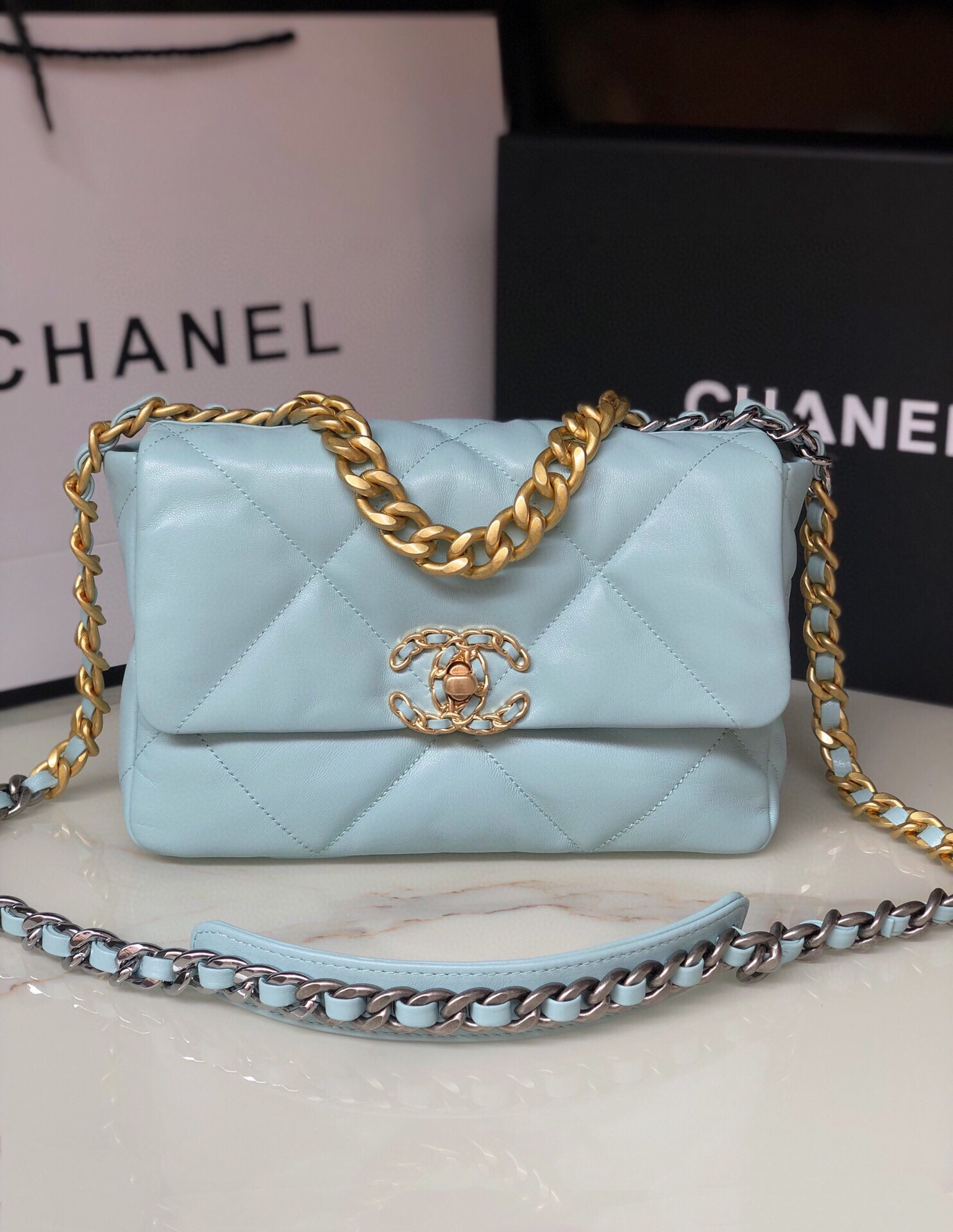 Ch**el 19 HANDBAG Shiny Leather, Gold-Tone, Silver-Tone & Ruthenium-Finish Metal Light Blue 6.2 × 10.1 × 3.5 in