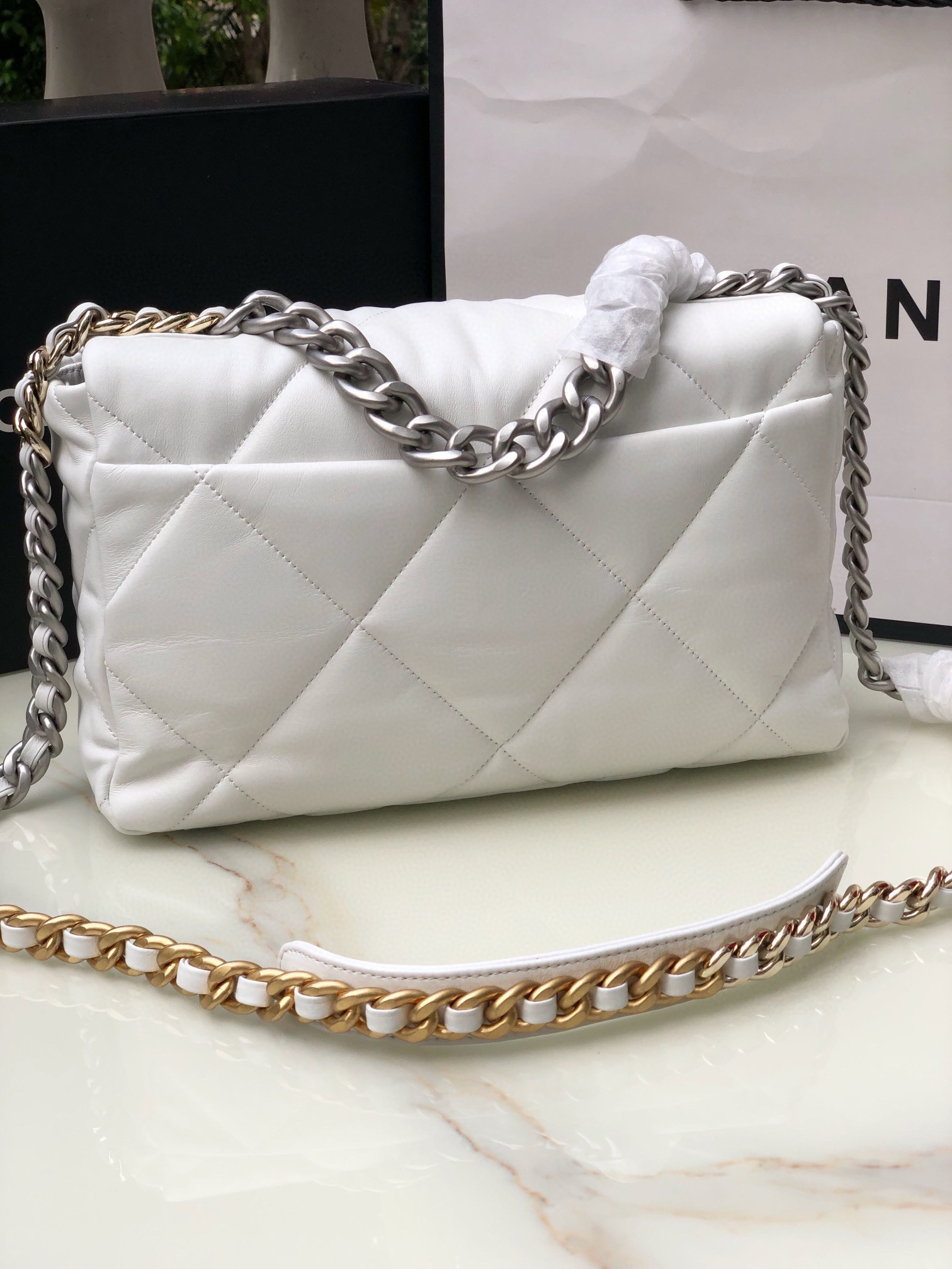 Ch**el 19 LARGE HANDBAG Shiny Leather, Gold-Tone, Silver-Tone & Ruthenium-Finish Metal White 7.8 × 11.7 × 3.9 in