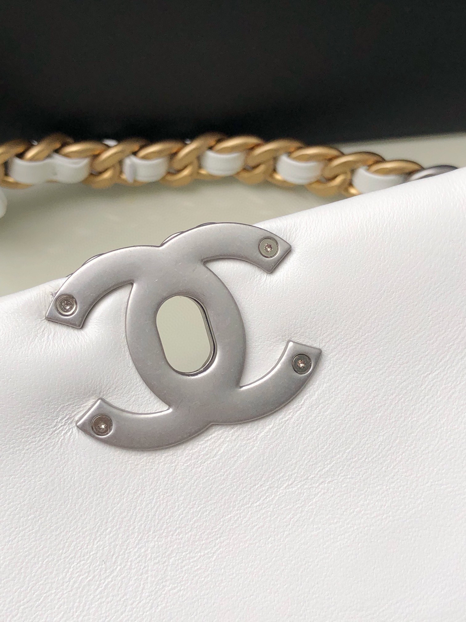 Ch**el 19 LARGE HANDBAG Shiny Leather, Gold-Tone, Silver-Tone & Ruthenium-Finish Metal White 7.8 × 11.7 × 3.9 in