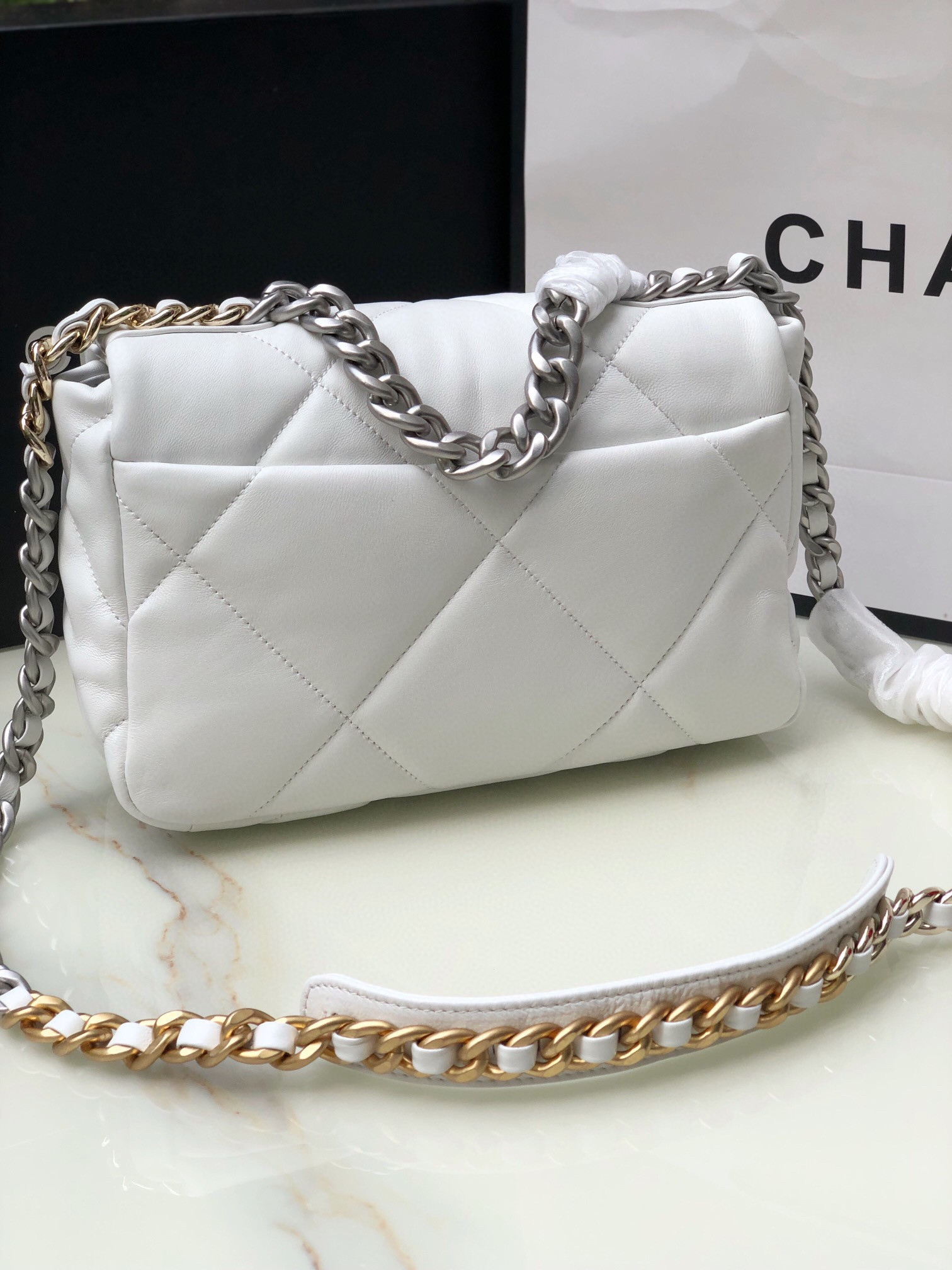 Ch**el 19 HANDBAG Shiny Leather, Gold-Tone, Silver-Tone & Ruthenium-Finish Metal White 6.2 × 10.1 × 3.5 in