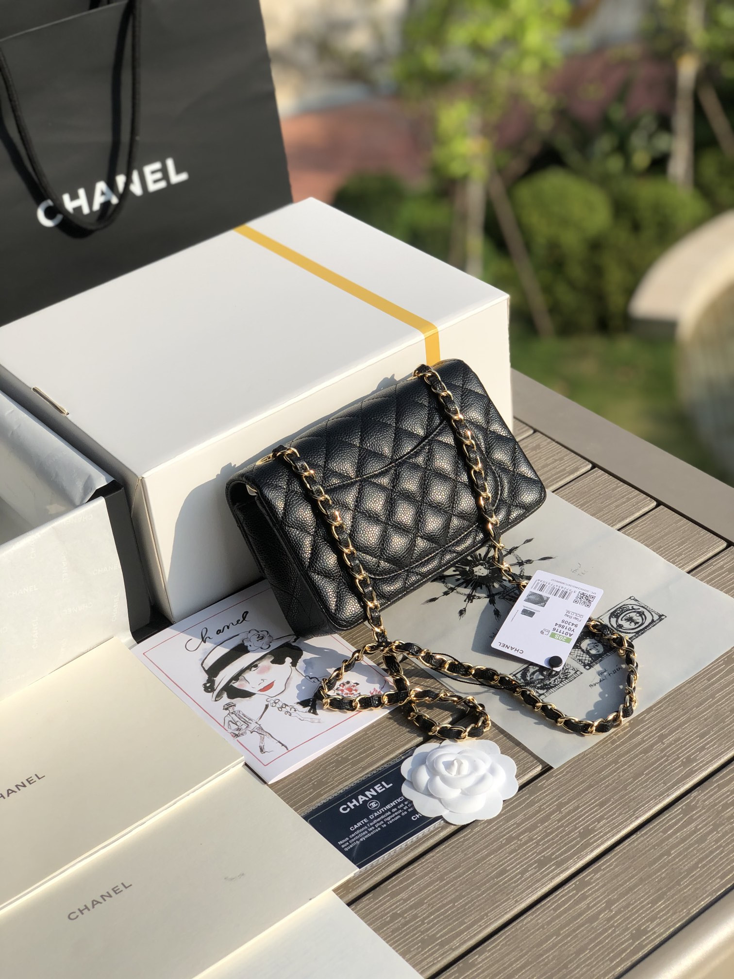 Ch**el MINI FLAP BAG BLACK WITH GOLD-TONE MENTAL 4.7 × 7.8 × 2.3 in