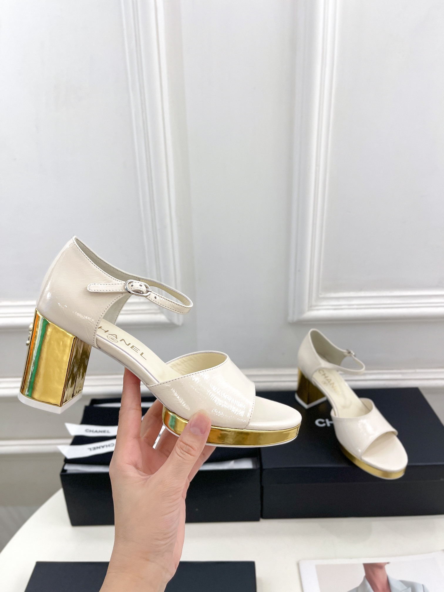 UA Ch**el HEELED SANDALS