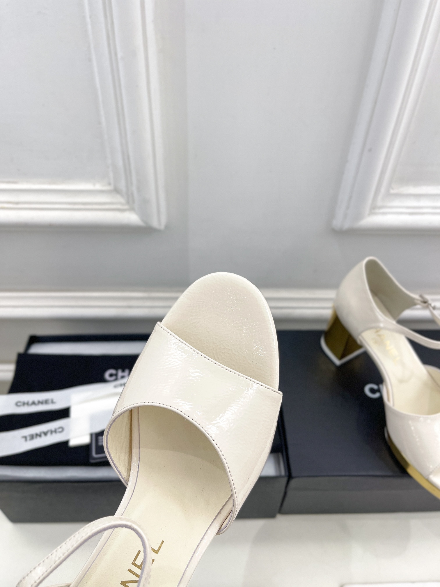 UA Ch**el HEELED SANDALS