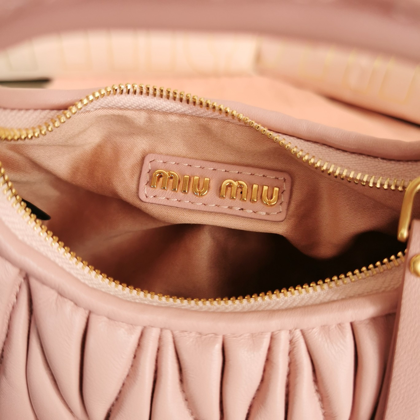 Miu Miu Wander matelassé nappa leather hobo mini-bag 14x17.5x5.5cm