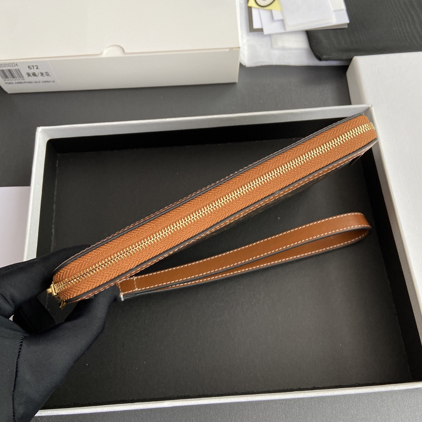 Ce1i*e LONG POUCH WITH STRAP in triomphe canvas and calfskin 21.5x11.5x1cm