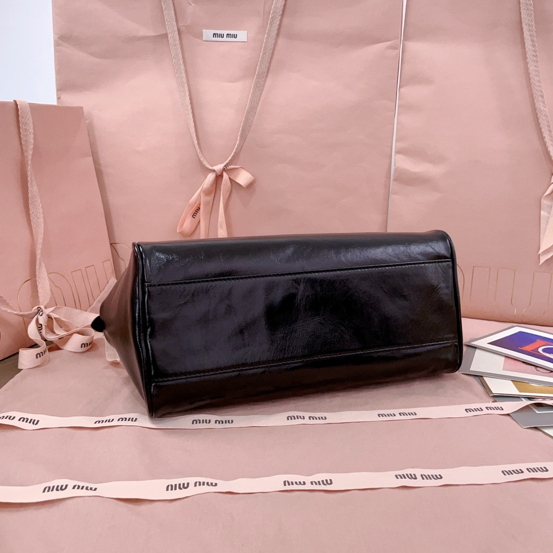 Miu Miu Leather top-handle bag 15x28x13cm