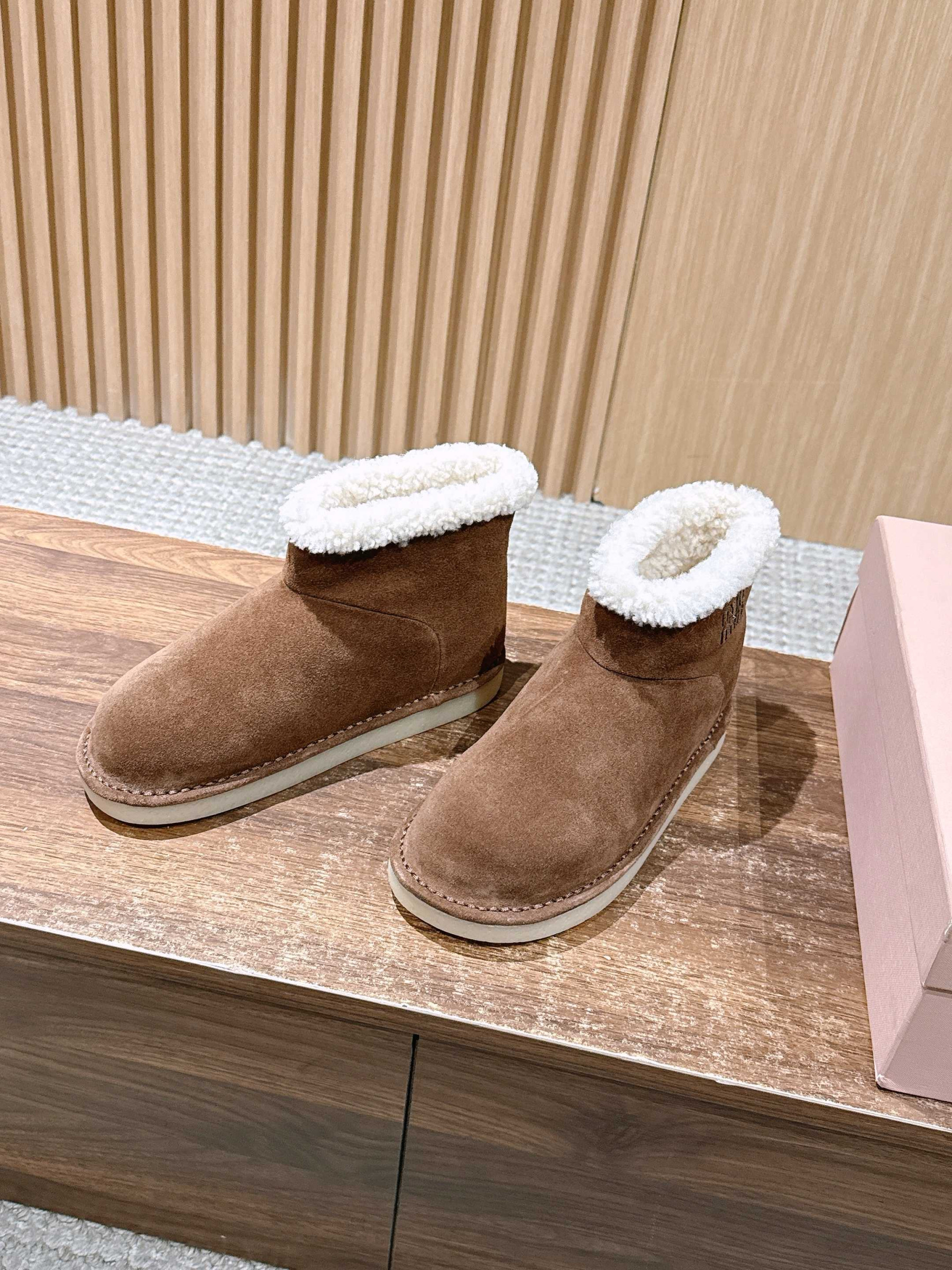 UA Miu Miu Suede and Shearling Booties