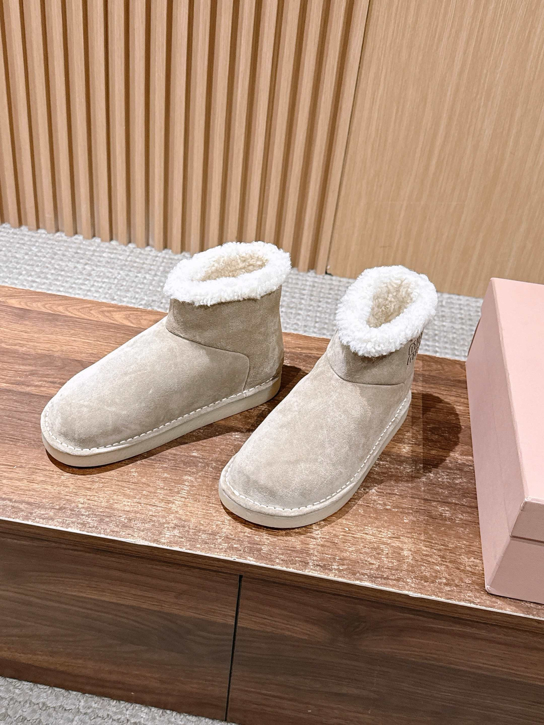 UA Miu Miu Suede and Shearling Booties
