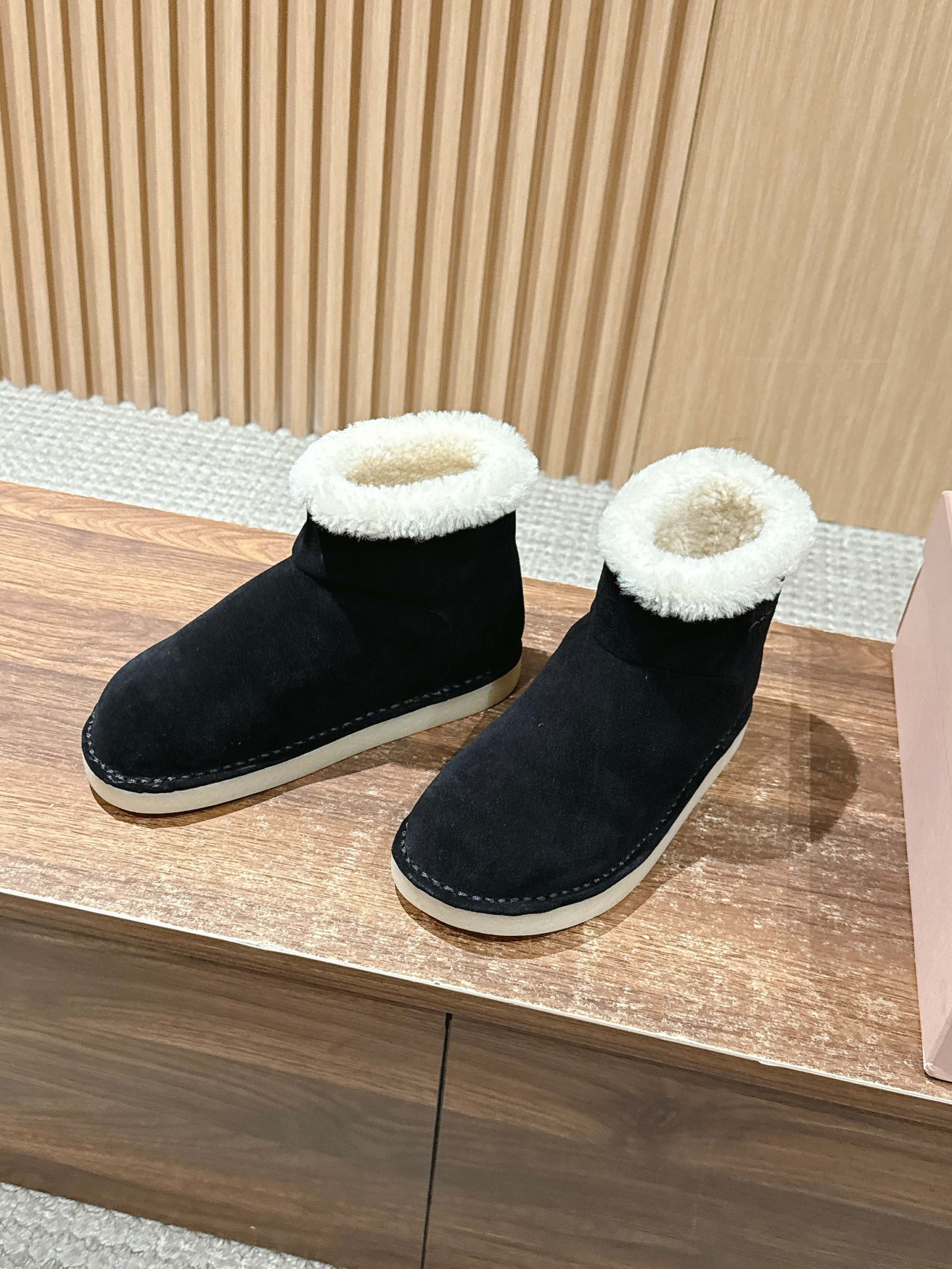 UA Miu Miu Suede and Shearling Booties