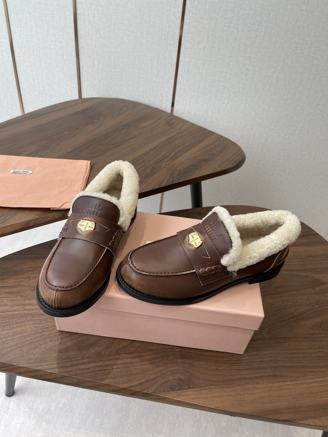 UA Miu Miu Bleached Leather and Shearling Penny Loafers