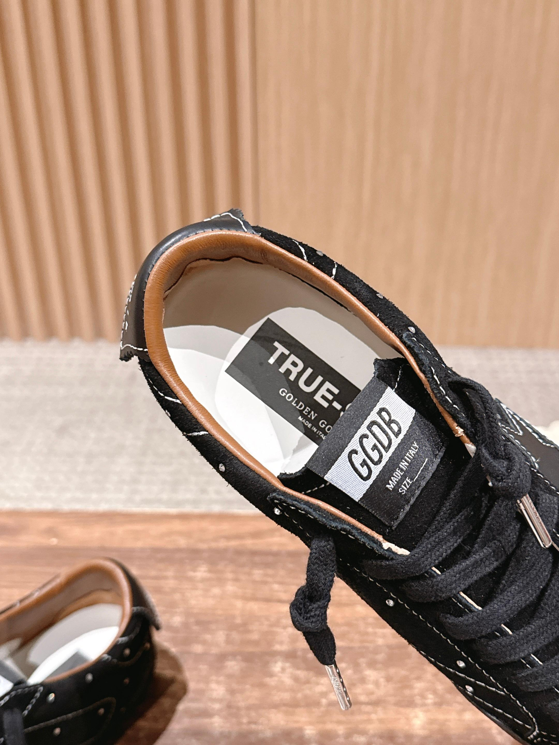 UA G01den G003e True-Star in Black Suede Sneaker