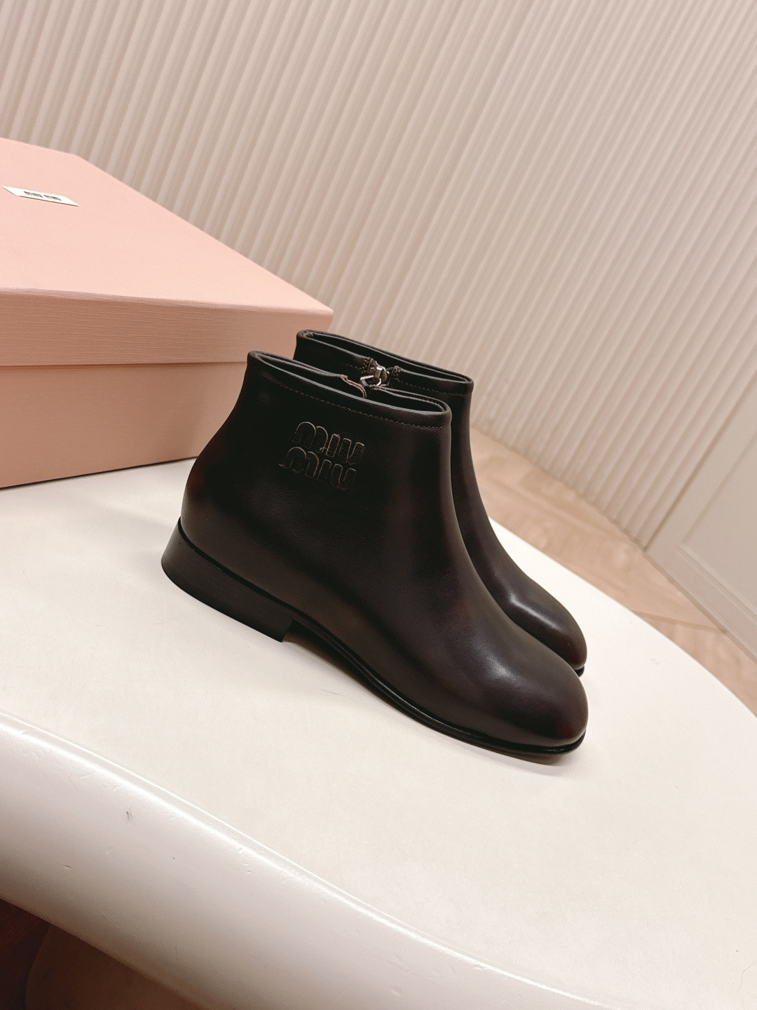 UA Miu Miu Fumé Leather Booties